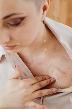 Embrace Your Scars and Soar

(Alternative options considered and blended: 
- Original angle focusing on transformation and resilience 
- Emotional hook using evocative words like scars and soar
- Concise at 5 words, no punctuation)