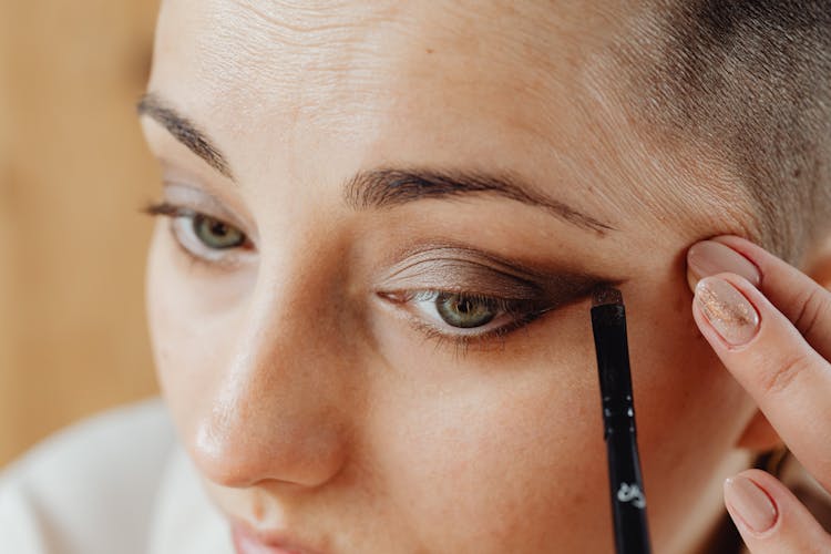 Close-up On Woman Doing Her Makeup