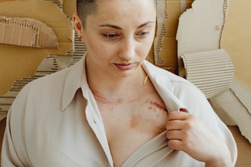 A Woman Showing a Scar
