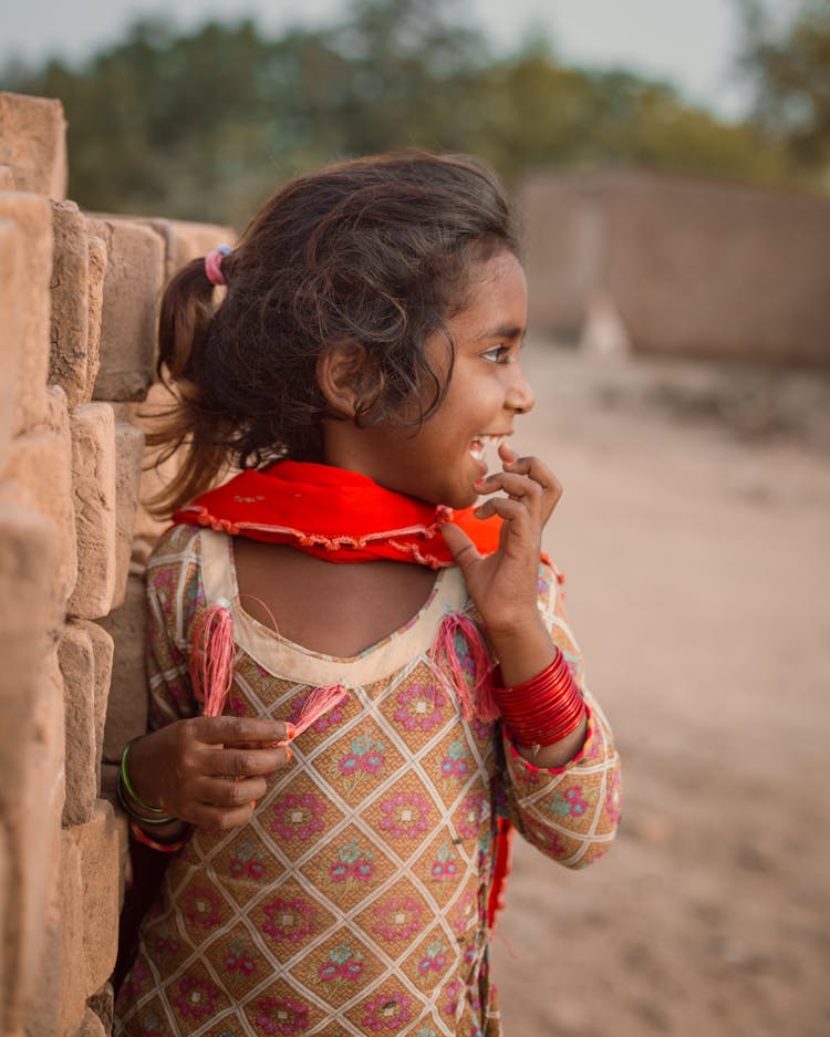 Laughing Little Girl In Traditional Masai Clothes