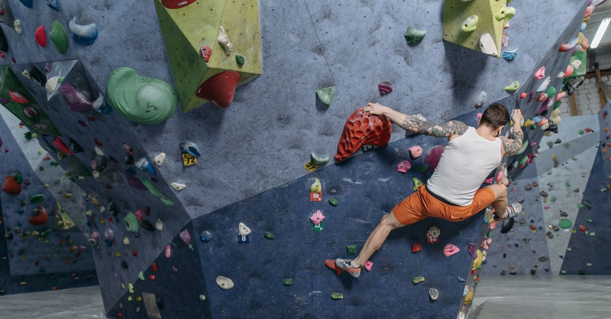 Rock climber bouldering on a challenging overhang