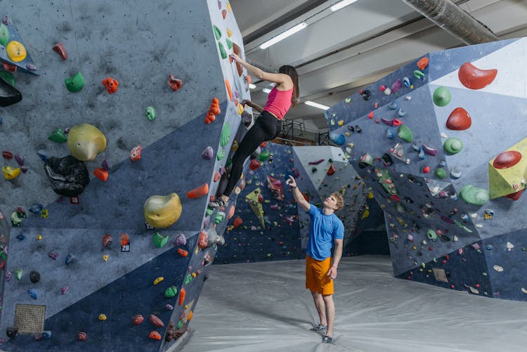 A Woman Doing Rock Wall Climbing