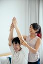 Asian couple having fun in room