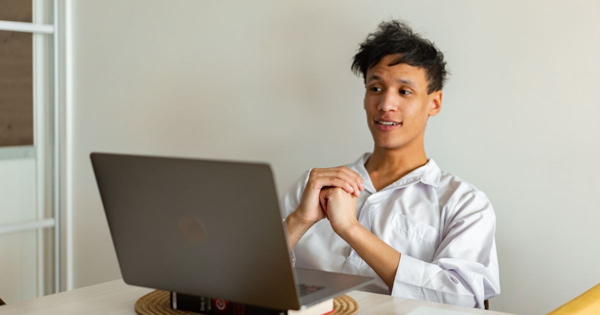 A student attending an online course for social services qualifications.