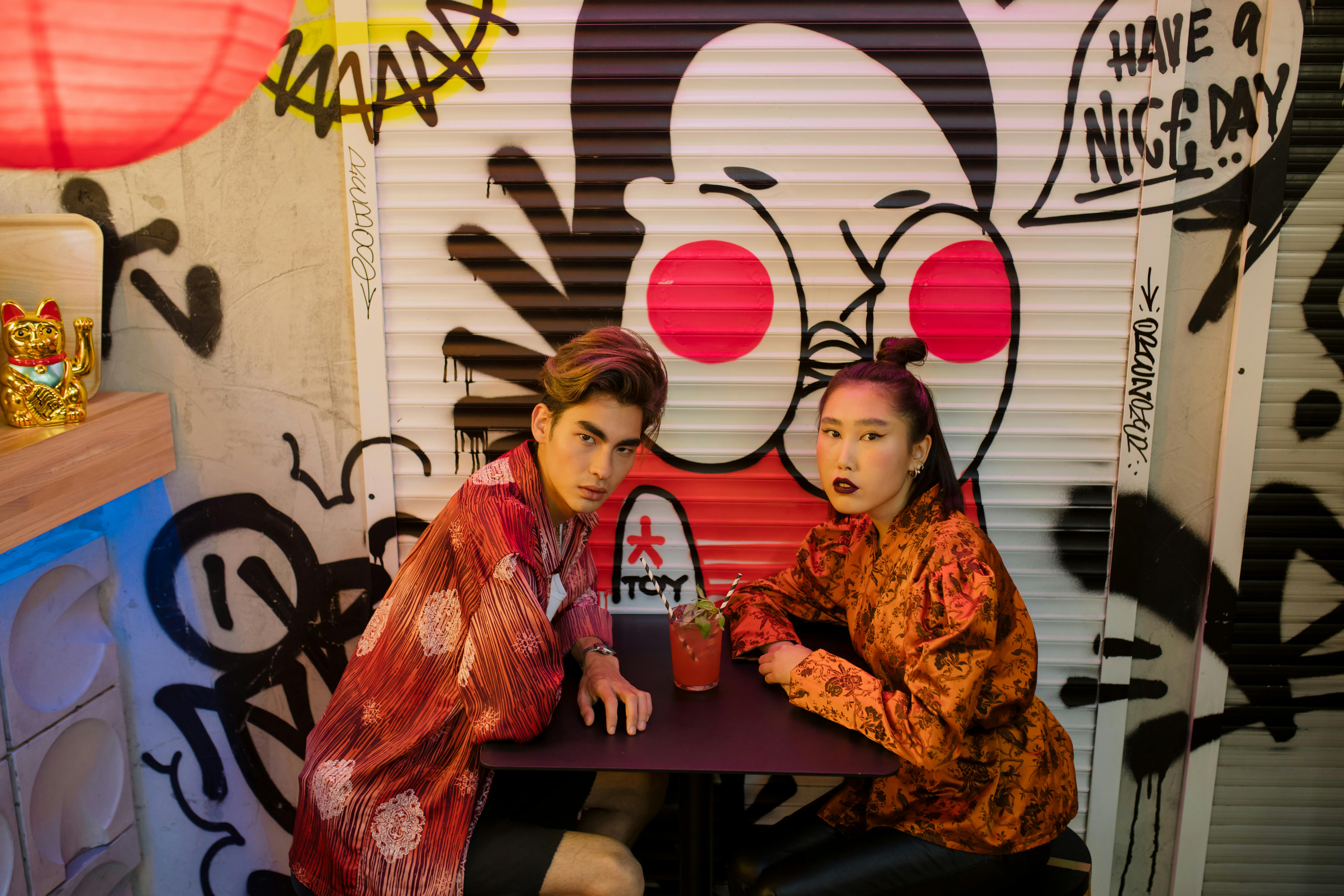 couple sharing a glass of juice