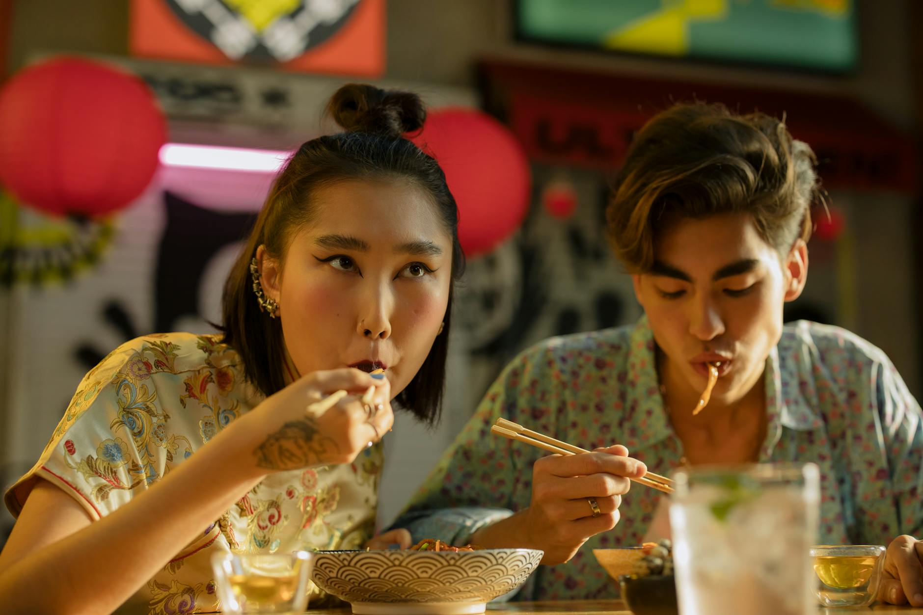 Couple Eating Bowl of Noodles