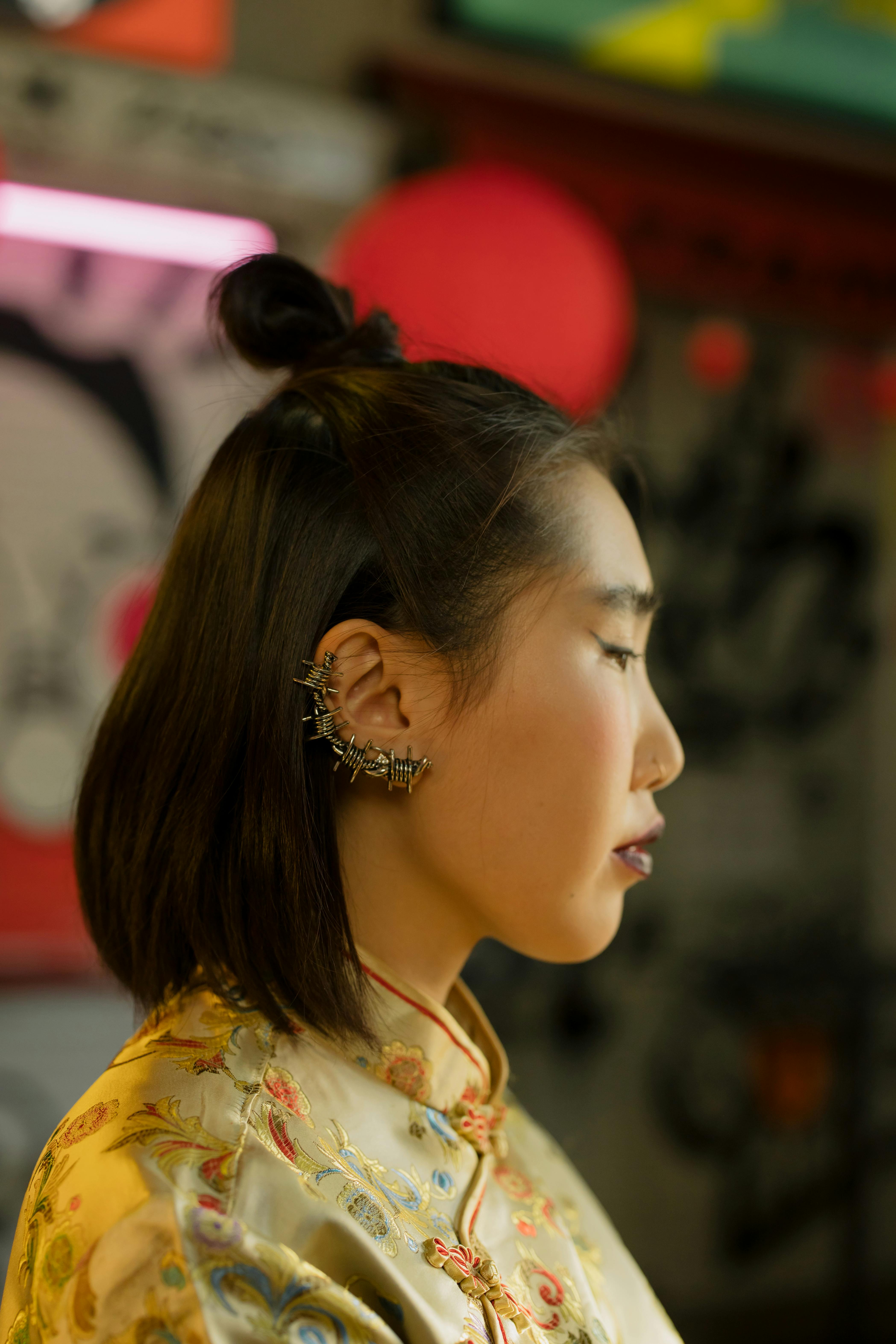 woman wearing fashionable earrings