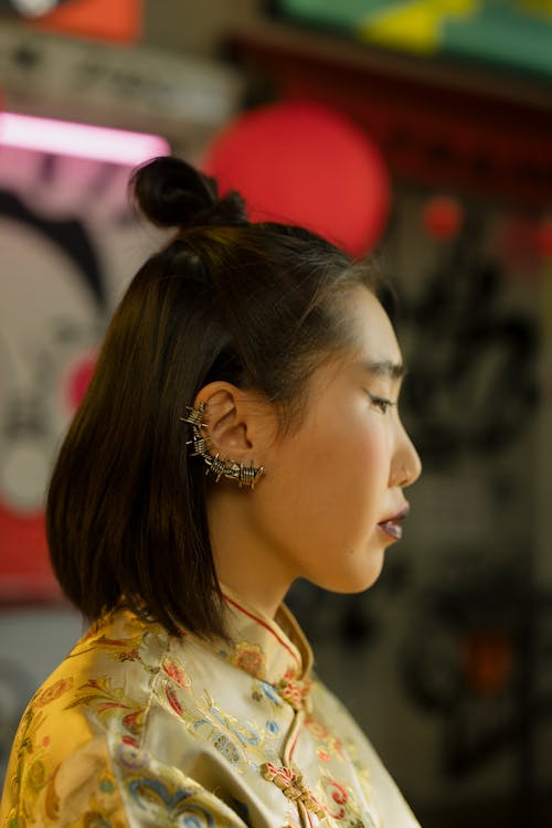 Woman Wearing Fashionable Earrings