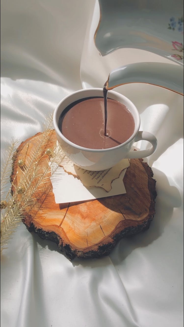 Cup Of Hot Cocoa On Wooden Stand