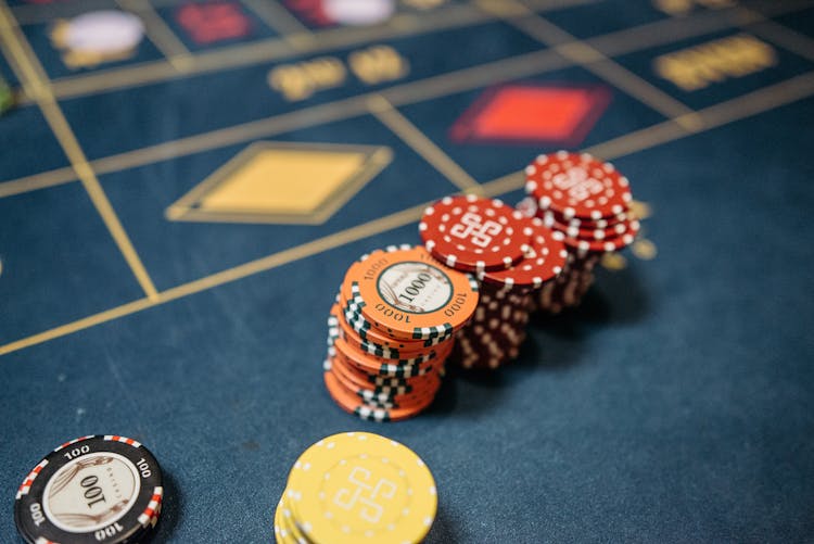 Casino Gambling Chips On A Roulette Table