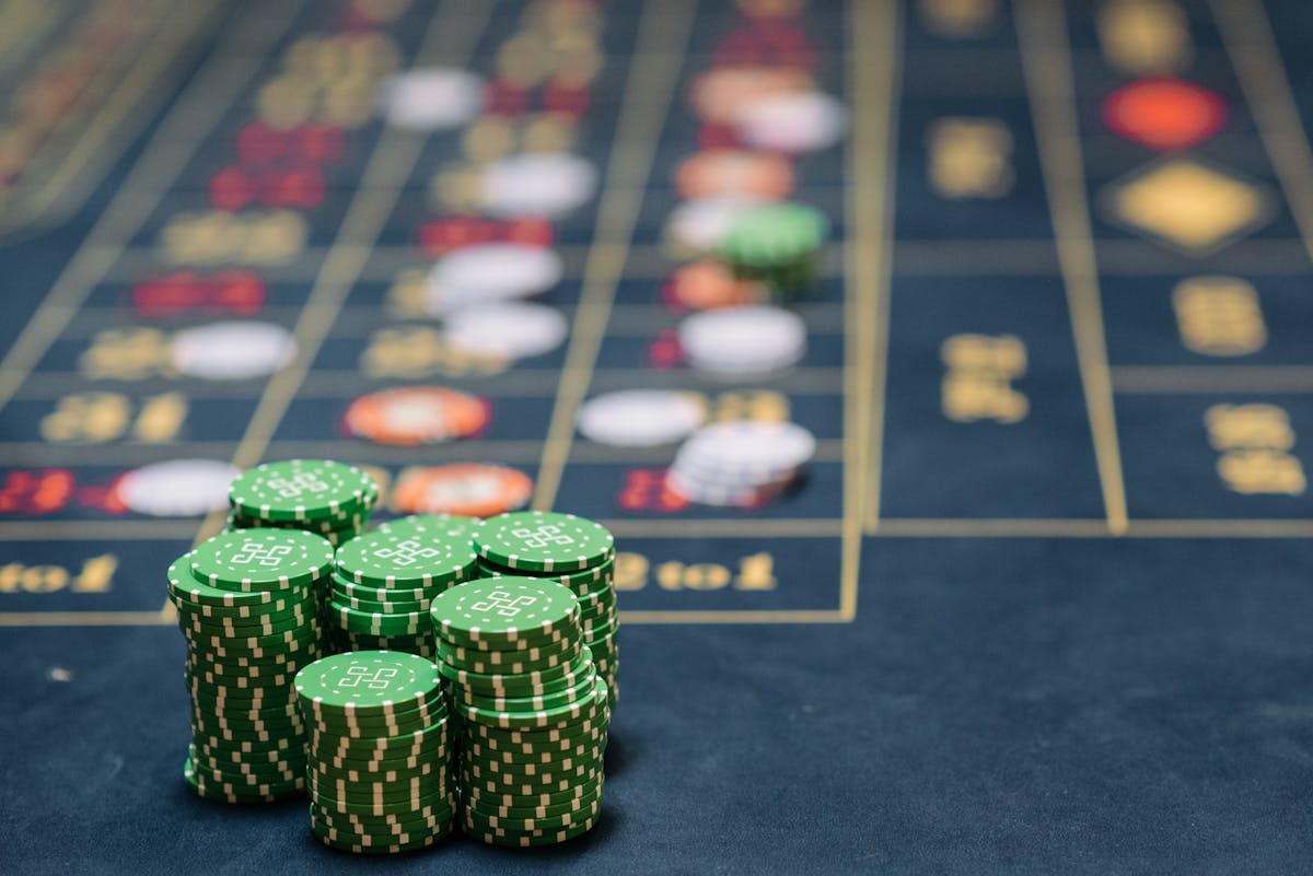 Stacks of Green Colored Gambling Chips