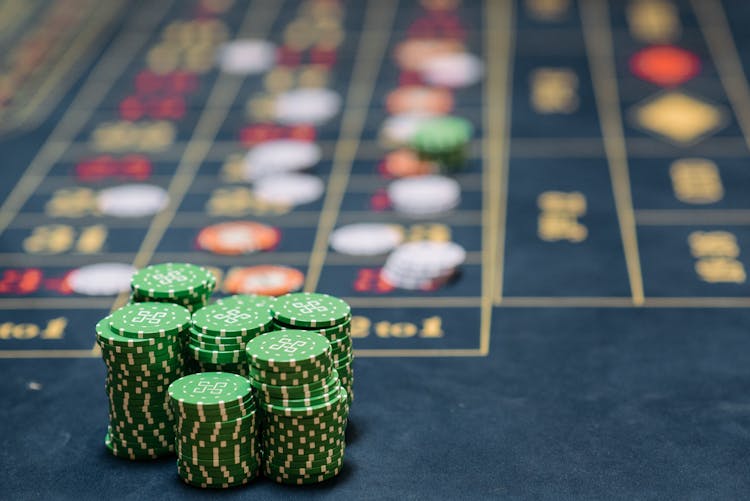 Stacks Of Green Colored Gambling Chips