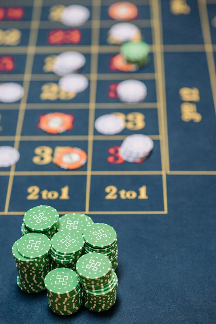 A Stack Of Poker Chips On The Table