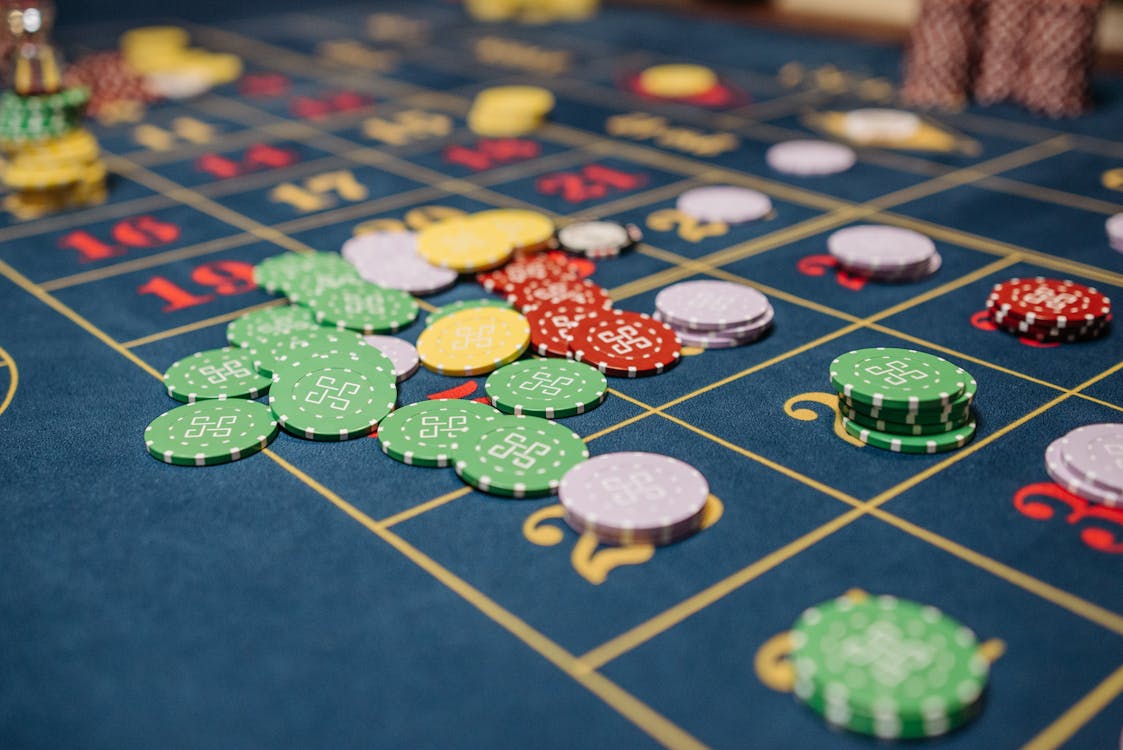 Free Colorful Round Chips on the Table Stock Photo