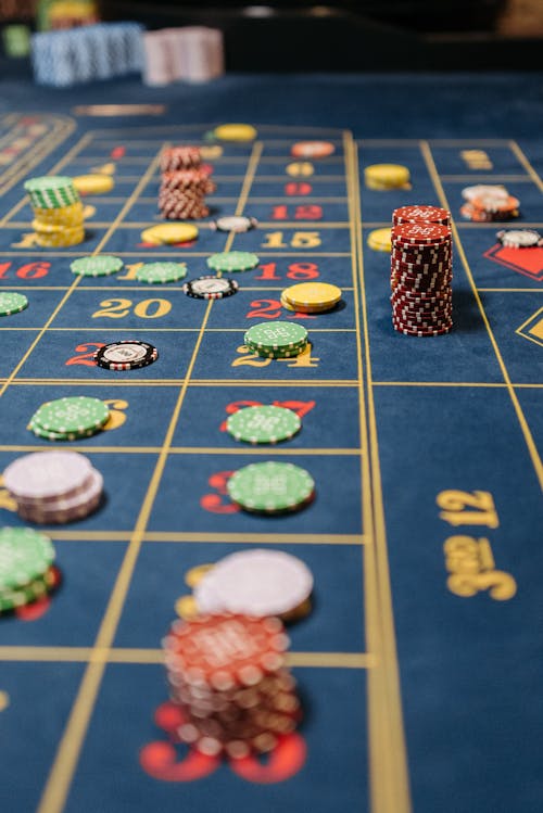 Free A Poker Chips on the Gaming Table Stock Photo