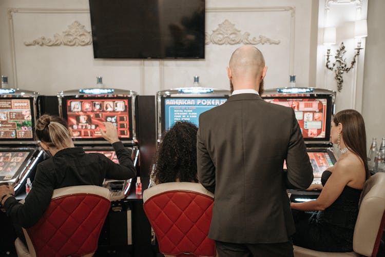 People Playing Slot Machines