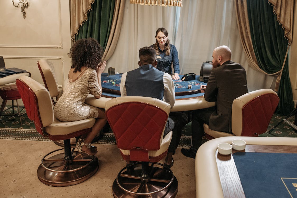 Free A Group of People Betting on the Game Stock Photo