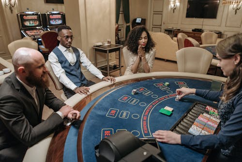 Gamblers Sitting around a Gaming Table