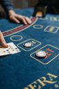 Playing Cards and Casino Chips on Gaming Table