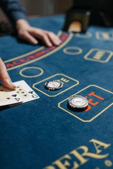 Playing Cards and Casino Chips on Gaming Table