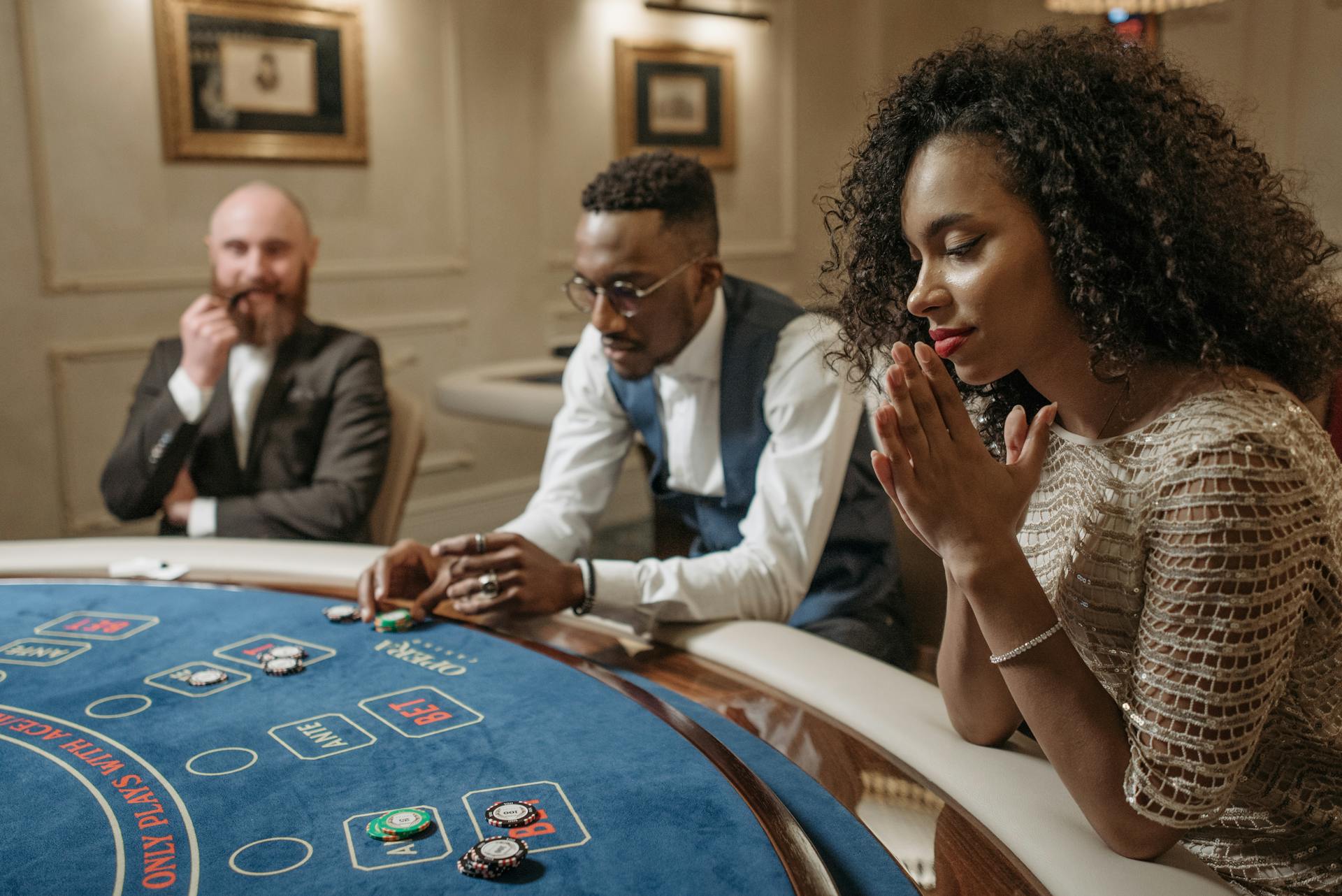 People Betting on a Casino Table