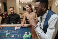 Man Serious Playing Poker
