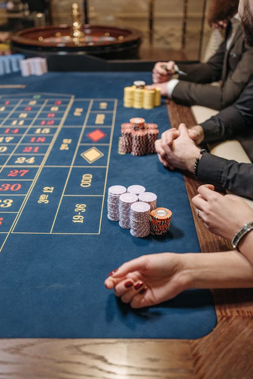 Free Hands on the Gaming Table  Stock Photo