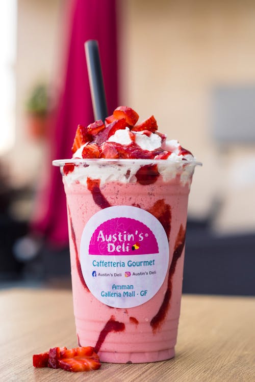 Strawberry Milkshake in a Plastic Cup