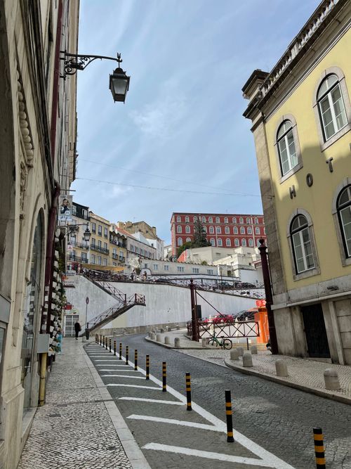 Free Picturesque city street with classic architecture and European charm. Stock Photo
