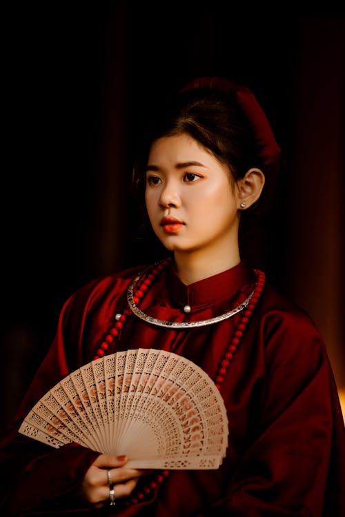 Portrait of a Young Woman in Traditional Clothing 