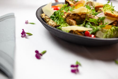 Vegetable Dish on Black Ceramic Bowl