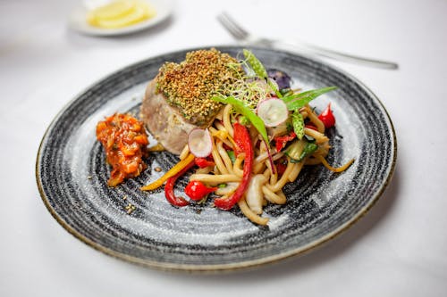 Mouthwatering Pasta Dish on a Ceramic Plate