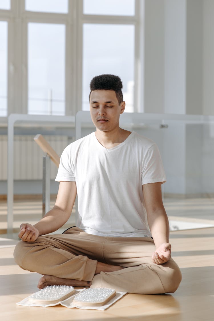 A Man In Lotus Position Concentrating