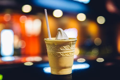 Free Beige Cone Filled With White Vanilla Ice Cream Stock Photo