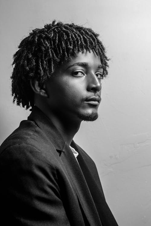 Man in Suit With Dreadlocks