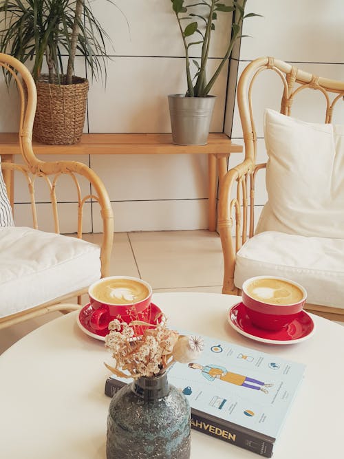 Red Ceramic Mugs on White Table