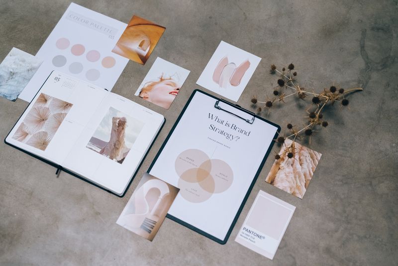Finished branded print materials arranged in a Seattle business workspace