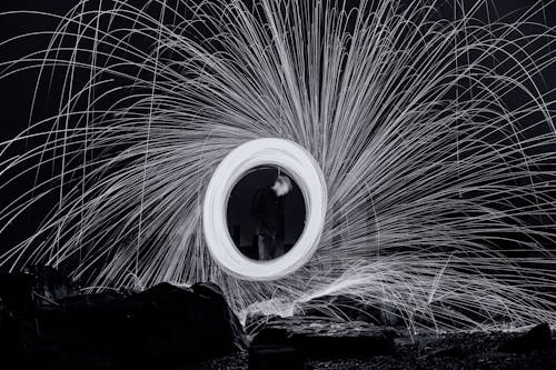 A Man Behind a Spinning Fireworks