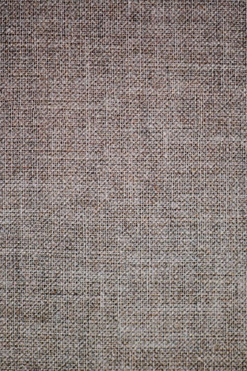 Free Detailed close-up of beige fabric texture, perfect for background use. Stock Photo