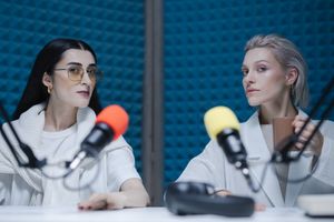Two hosts recording in a soundproof studio — photo by cottonbro studio on Pexels