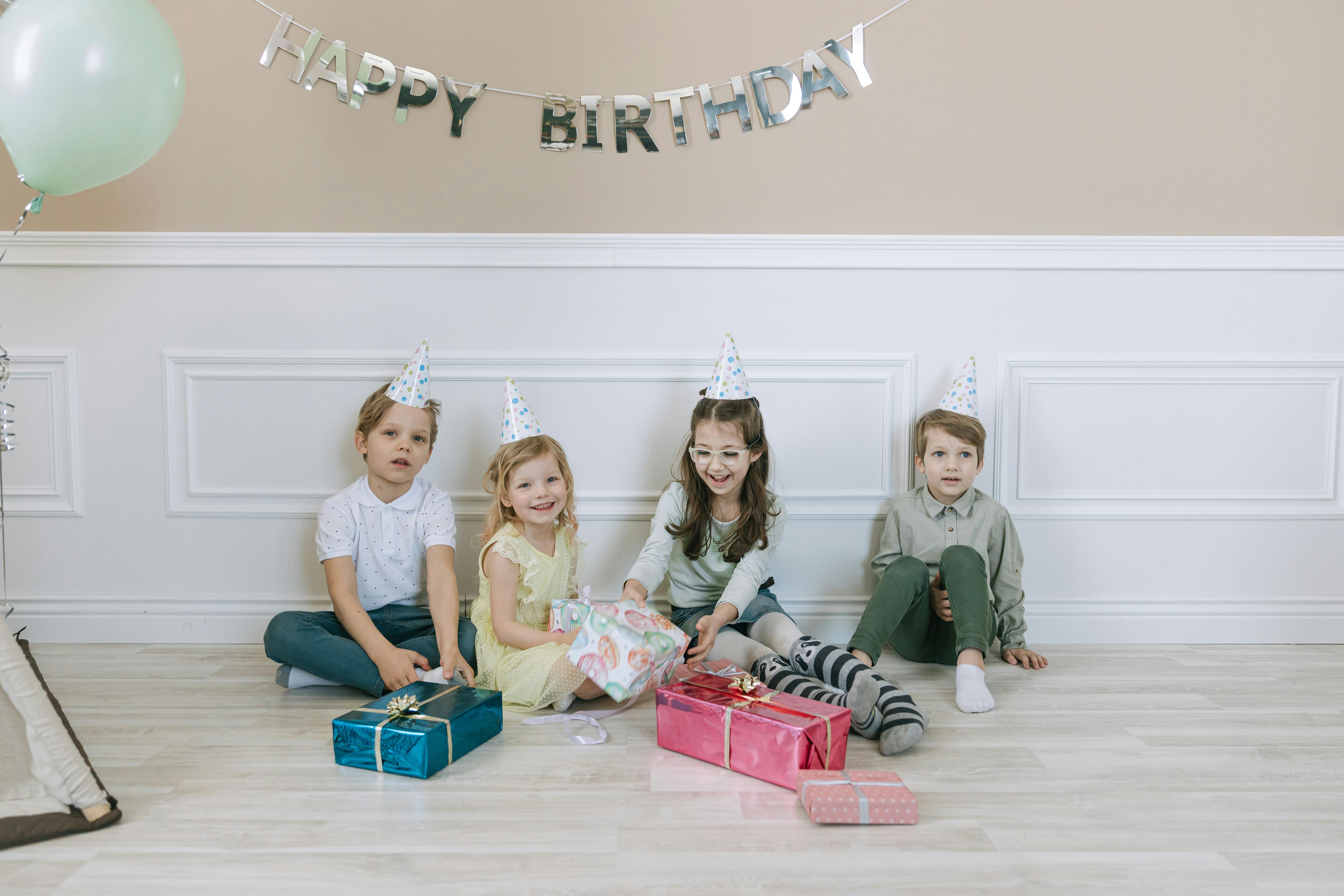 kids sitting on wooden floor