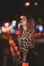 Woman Wearing Animal Print Blouse Looking Up