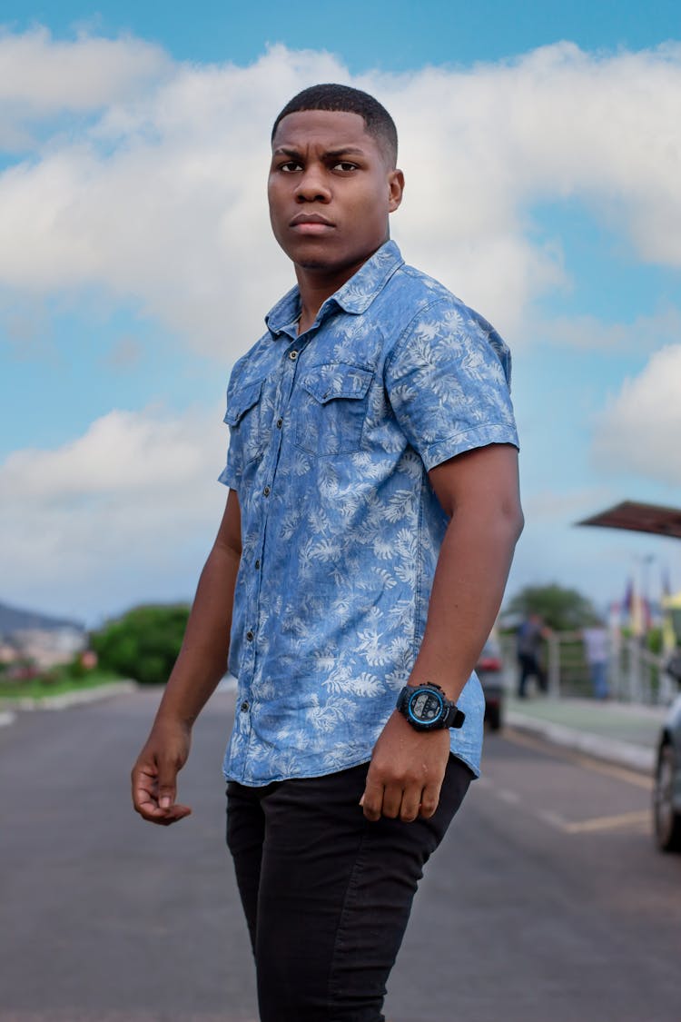 Portrait Of A Man In A Blue Shirt