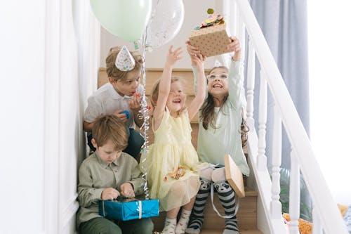 Free Kids Sitting on the Stairs Stock Photo