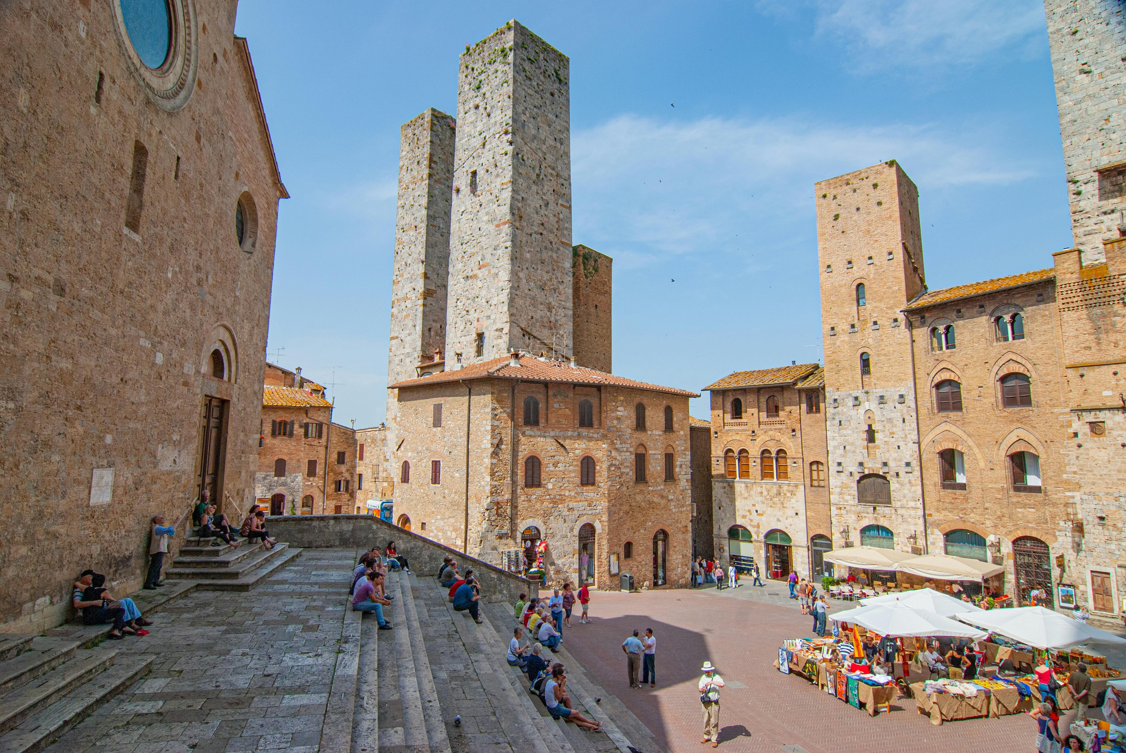 People at Piazza del Duomo in San Gimignano, Italy · Free Stock Photo