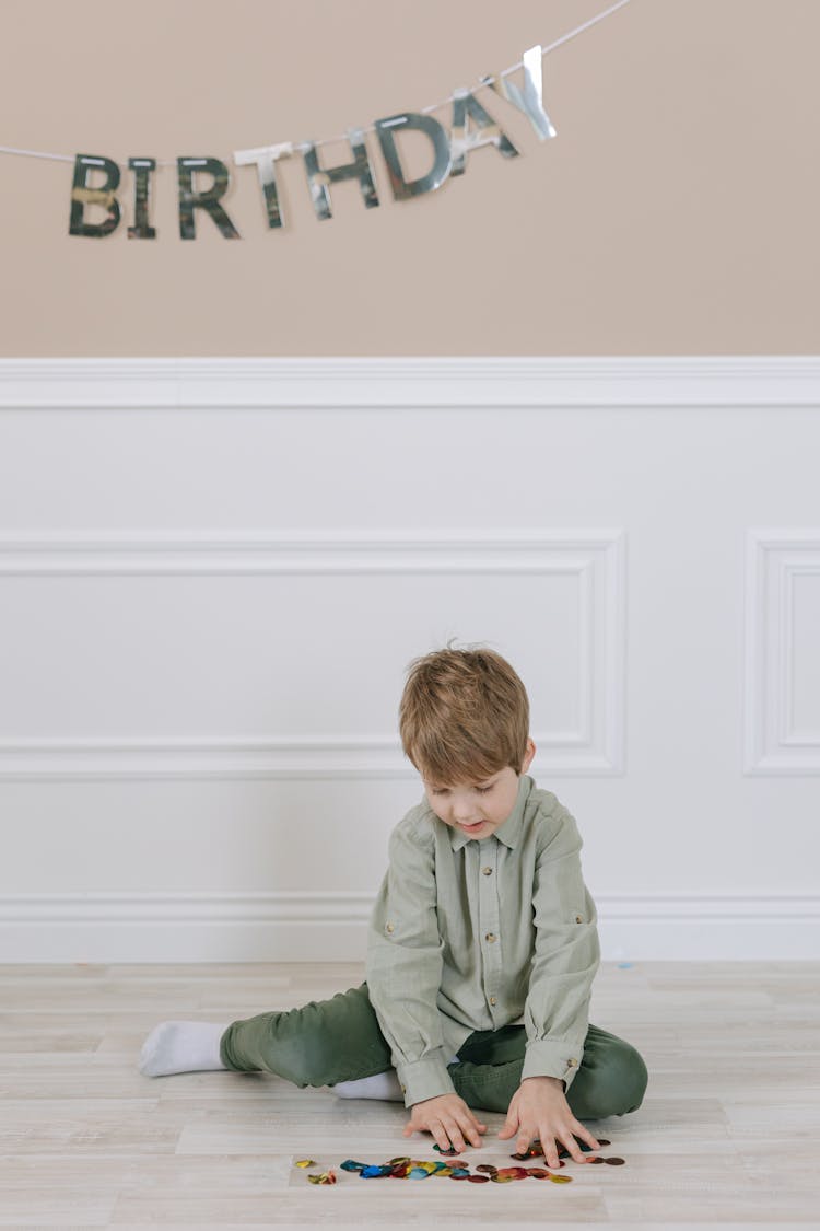 Kid Playing On The Floor