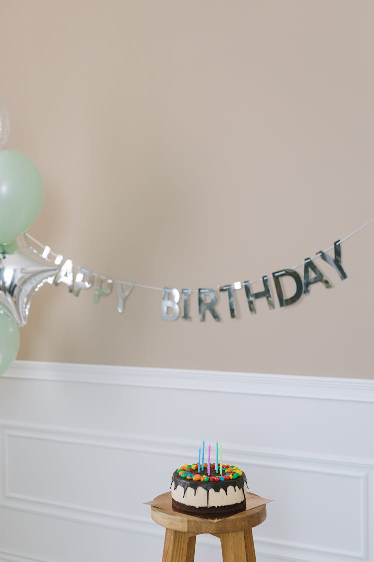 A Birthday Cake On A Bar Stool