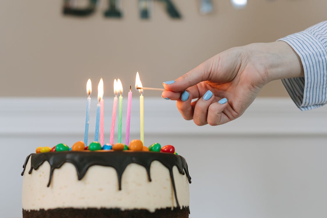Free Birthday Cake with Lighted Candles Stock Photo