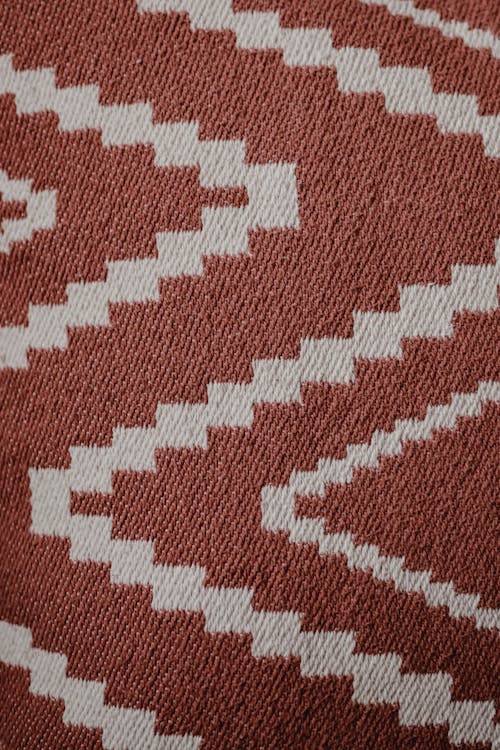 White Zigzag Pattern on Red Fabric