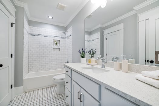 Contemporary bathroom featuring elegant subway tiles and sleek fixtures.
